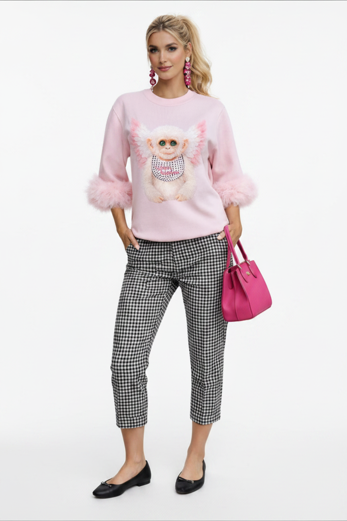 Sudadera rosa con gráfico y plumas en los puños