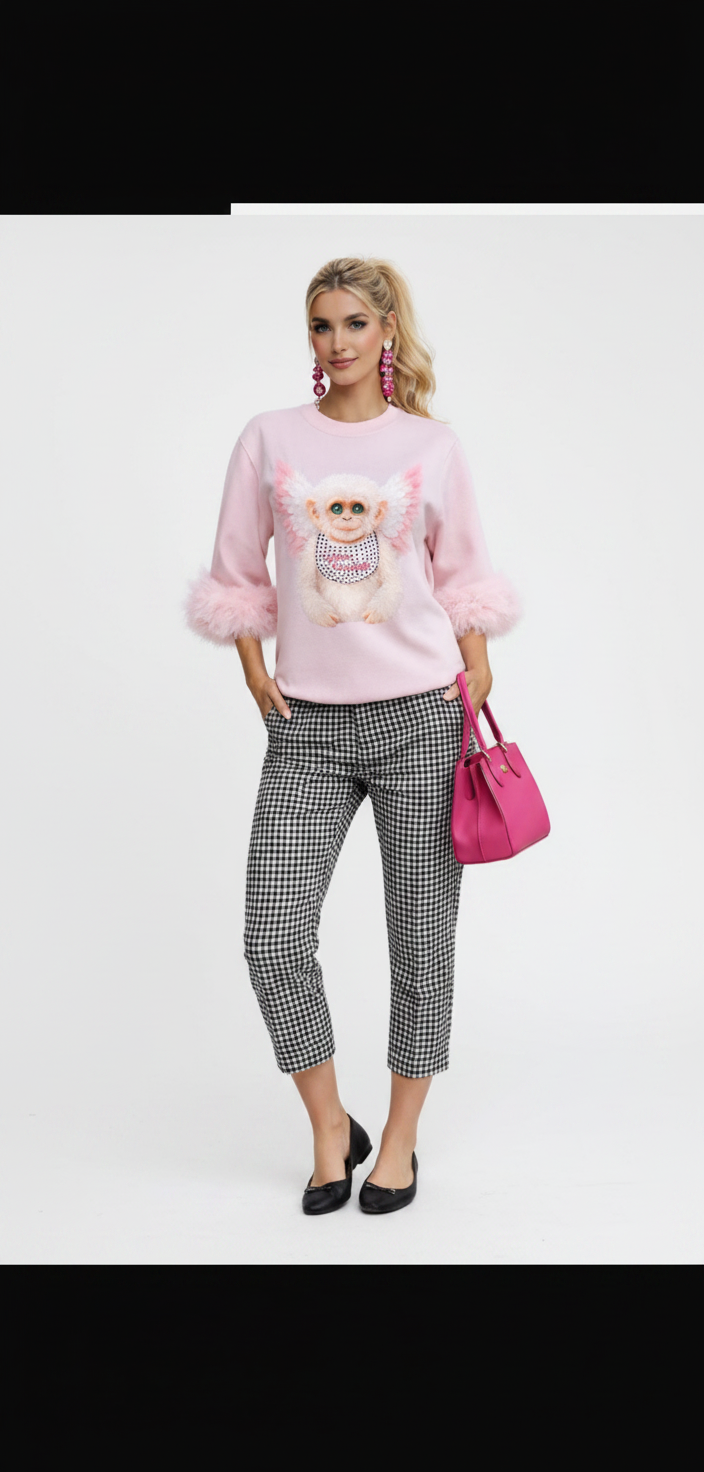Sudadera rosa con gráfico y plumas en los puños 2